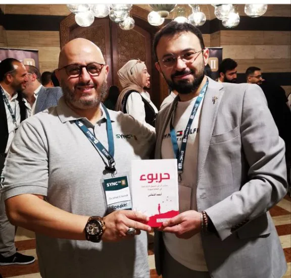Ahmad Nahas with Dr. Jihad Yaqoub at the book signing